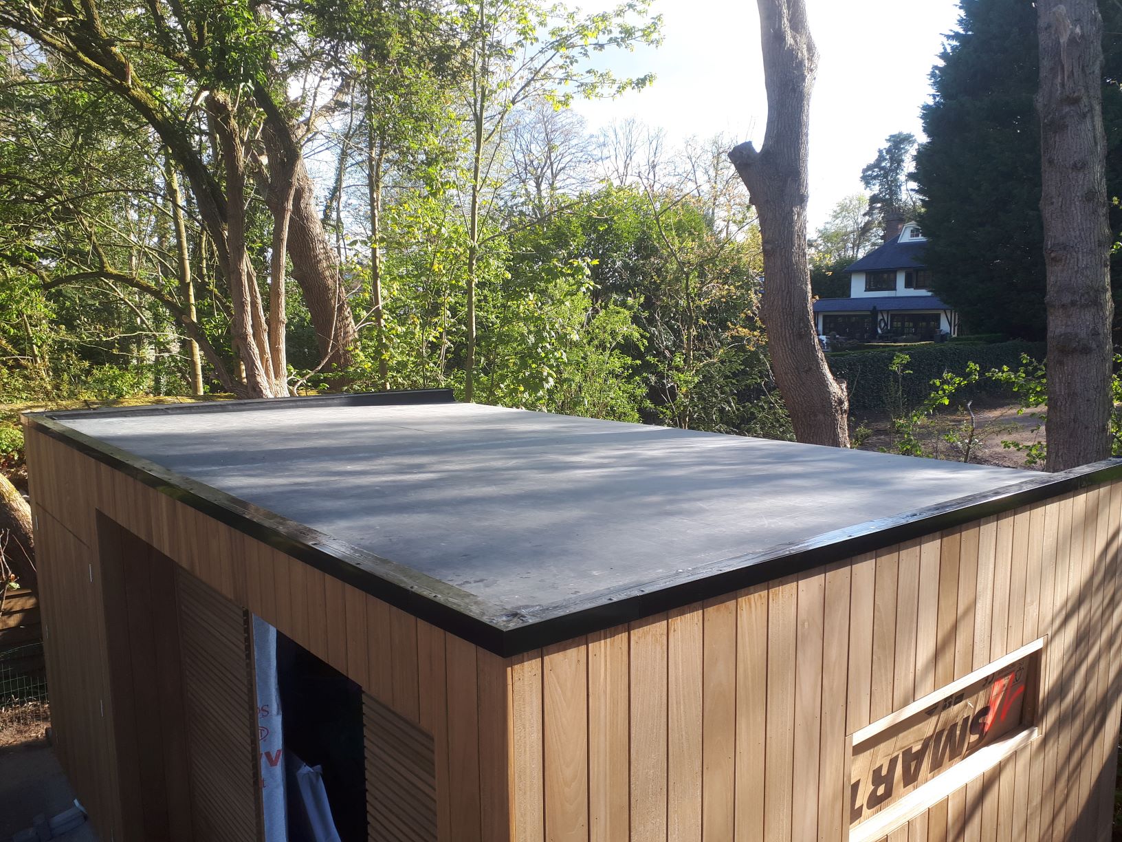 Huiswerk maken moreel De onze Poolhouse of tuinhuis plat dak | Zelfdakstore - met gemak een nieuw dak